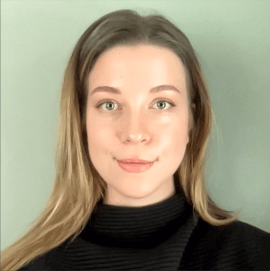 Evgeniia smiles into the camera.