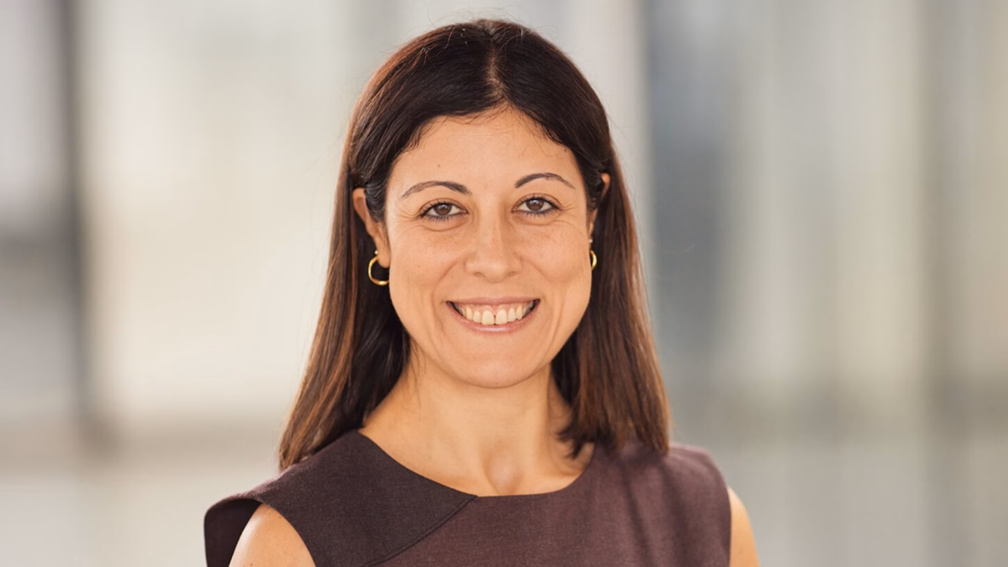 Banu Demir smiling at the camera