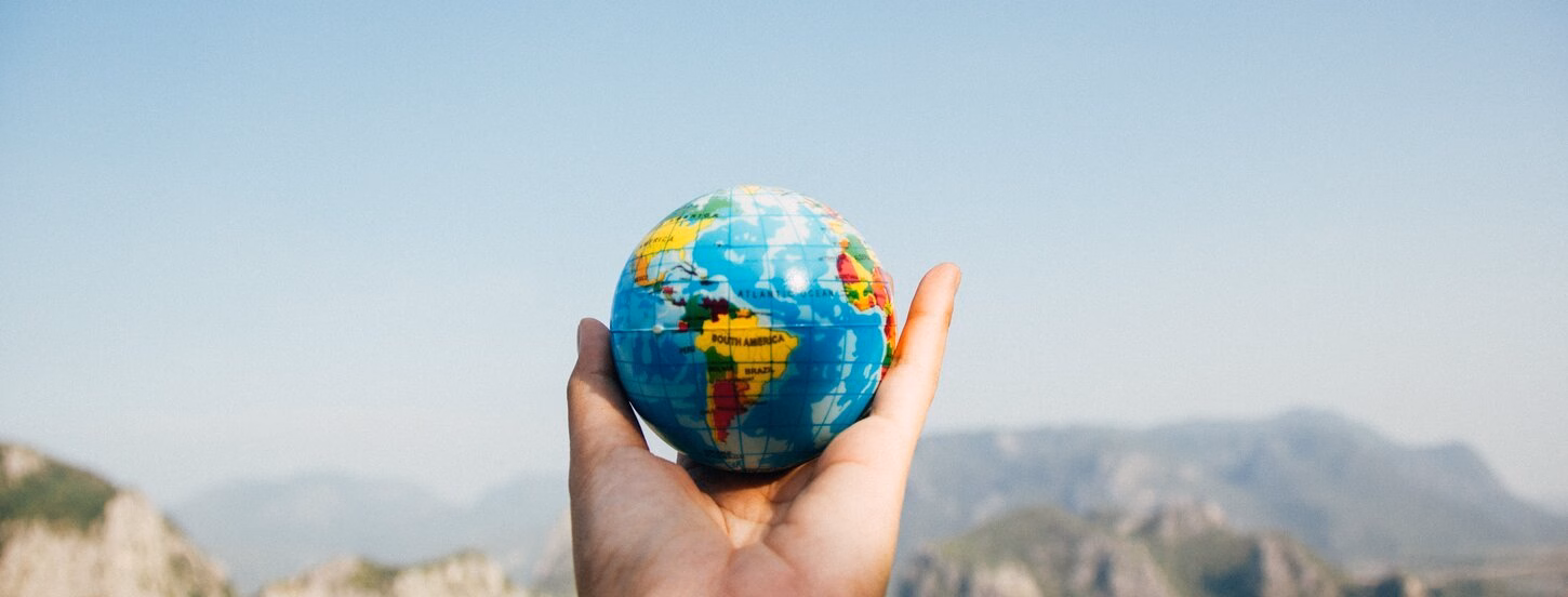 Globe in hand