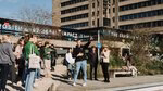 Ambassador gives a tour of the campus during the bachelor open day.