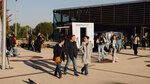 Prospective students walk across Campus Woudestein.