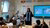 Professor Annelien Bredenoord in toga voor een bassisschoolklas.