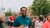 Participant runs and raises his thumb.