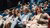 Annelien Bredenoord, Ed Brinksma and Ellen Verschoor are sitting in the front row of the cinema at the premiere of '110 jaar in 010'.