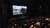 A full cinema at the premiere of '110 jaar in 010'.