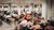 Students are taking an exam in an exam hall.