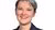 Anne Boring, woman with gray hair wearing a navy blazer and patterned blouse