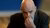 Portrait of Gianni Infantino looking distressed while pinching his nose