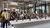 group listening to guide at museum Fenix